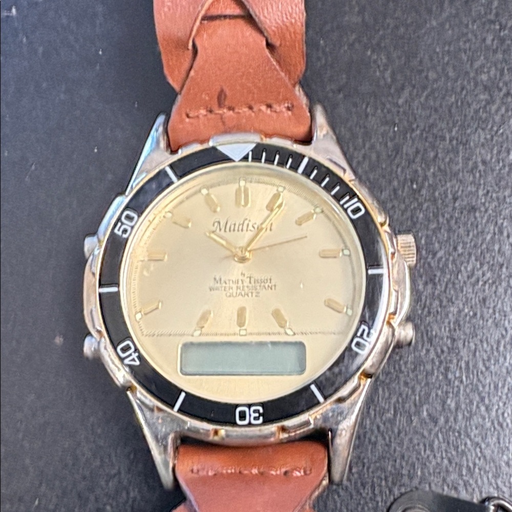 Vintage Madison  Marley TissotWatch in Gold Dial, Black Bezel and Brown Strap